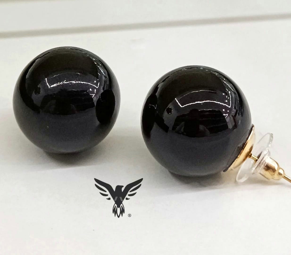 Cute black pearl studs.