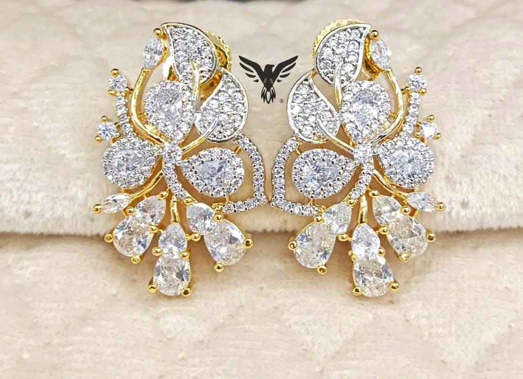 Glittering cubic zirconia studs in gold polish