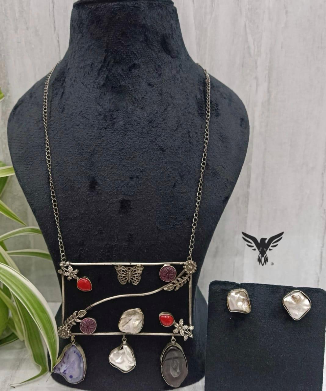 Methya Multi colored Silver Look Alike Necklace Set In Duzy Stones For Women