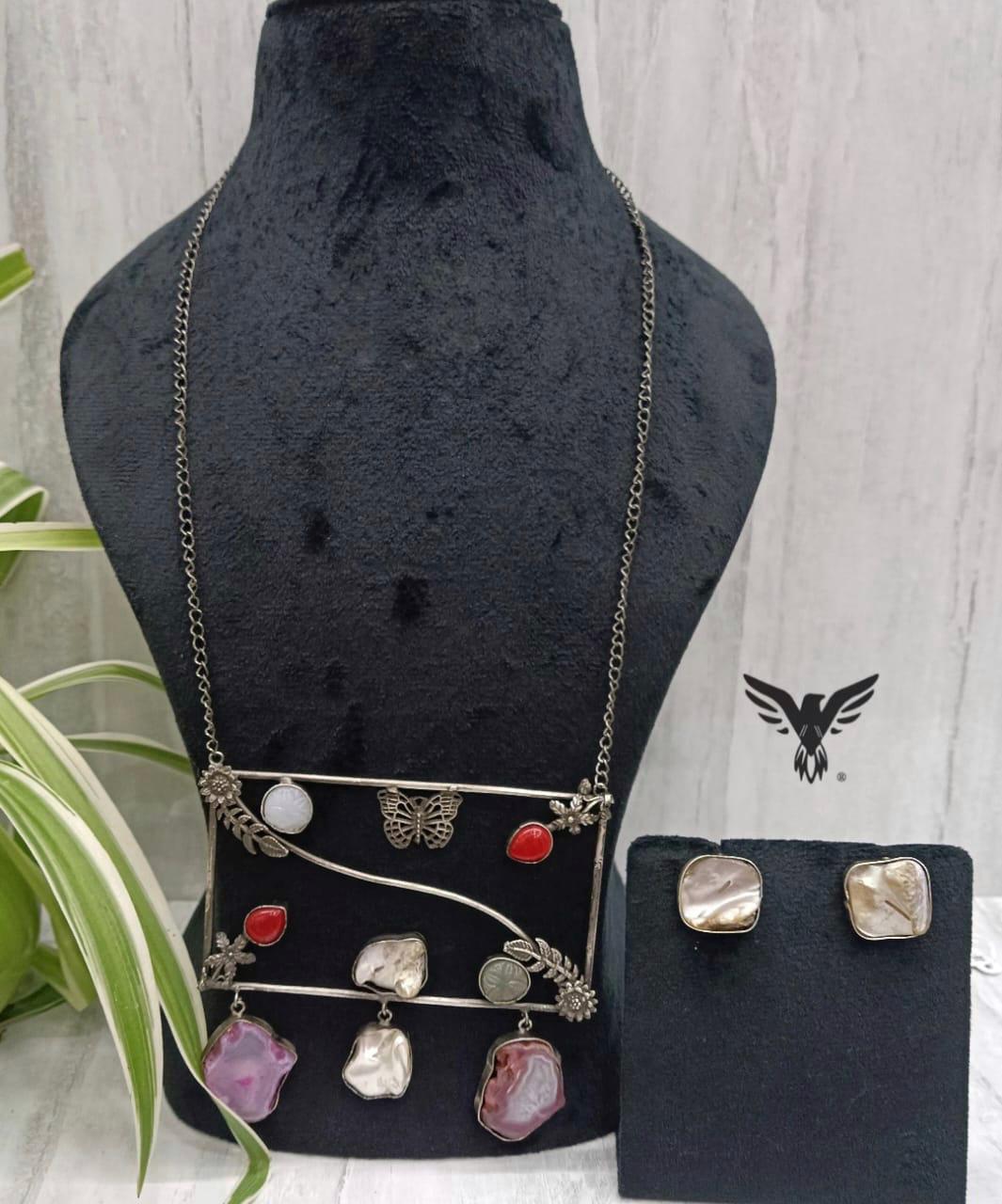 Medha Multi colored Silver Look Alike Necklace Set In Duzy Stones For Women