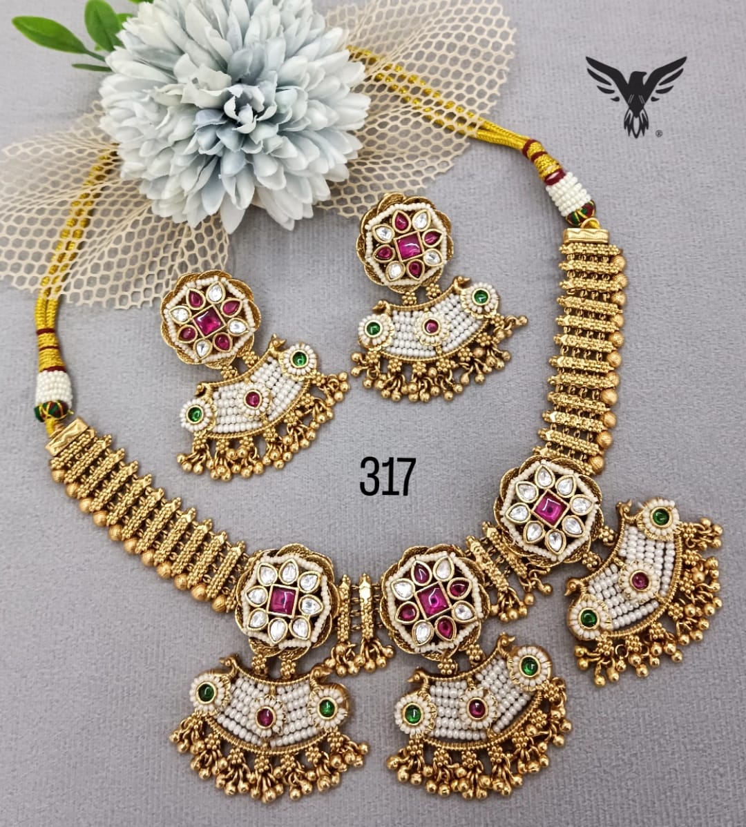 Ishaani Rajwadi style kundan necklace with golden earrings for occasion , celebrations and parties