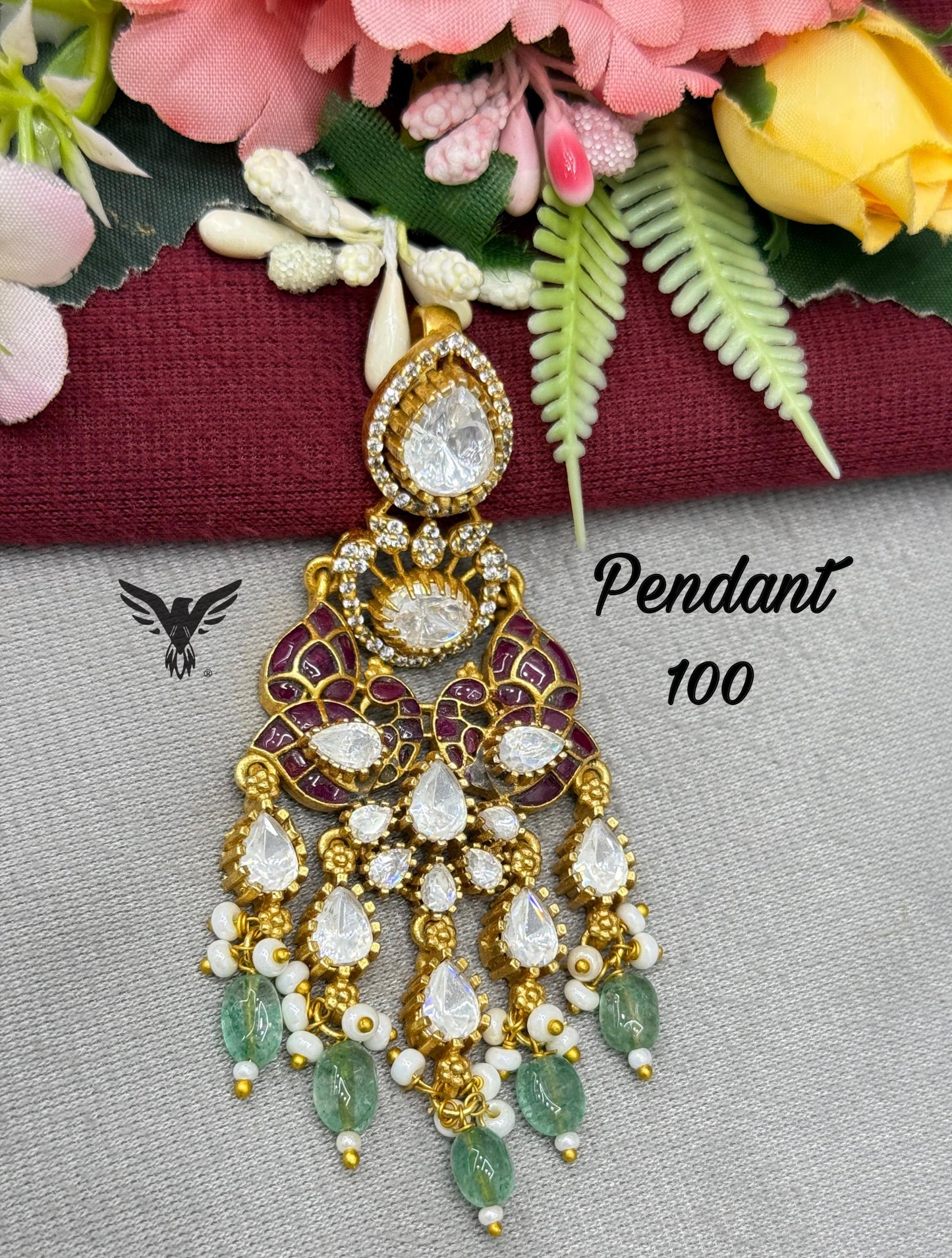 elegant mosanite with kemp stone pendent set in ruby for women