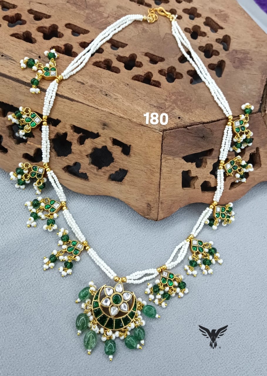 Chaand Paachi kundan pendent With side motives in emerald green for women