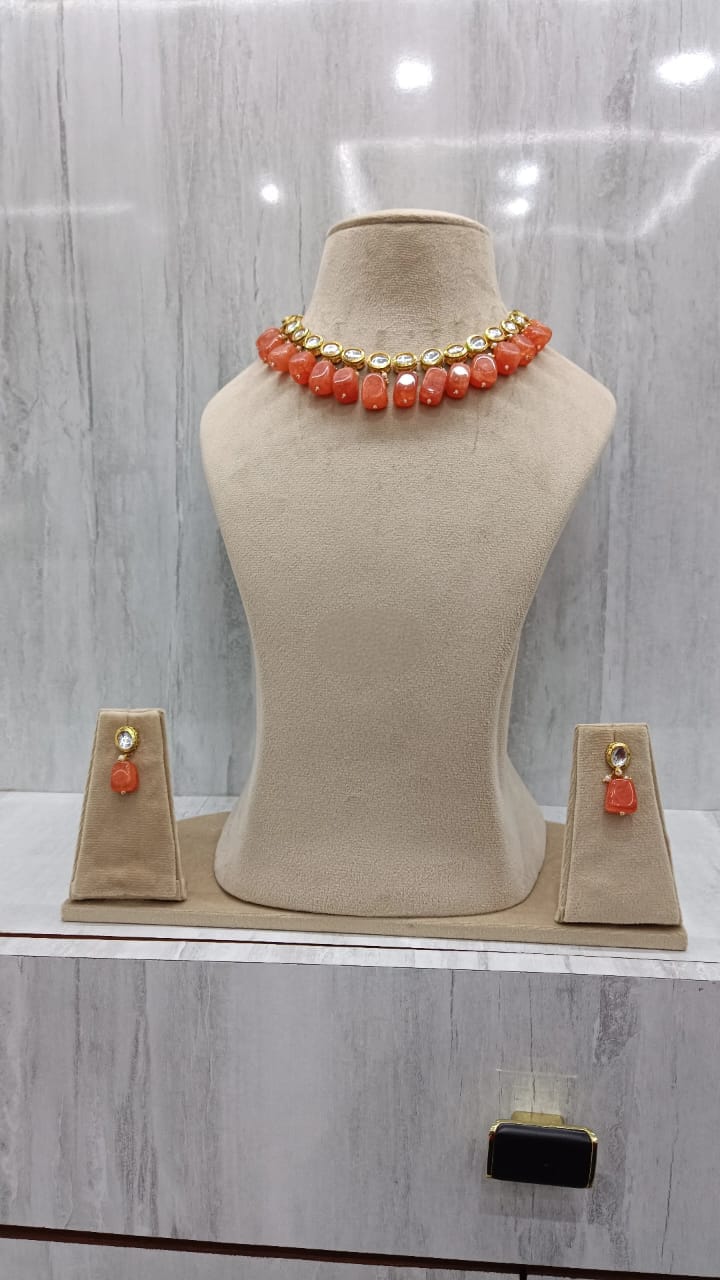 Jaypore Kundan neckklace with backside meenakari in orange stones