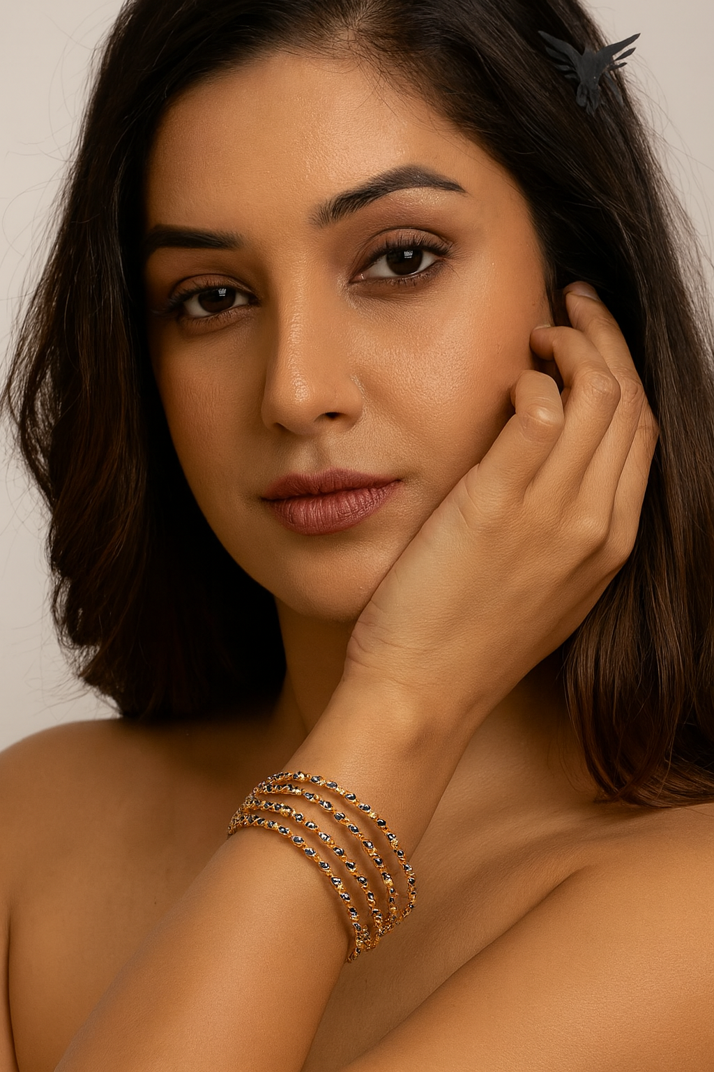 INFINITY SHAPE BLUE AND WHITE  STONE WITH GOLDEN POLISH BANGLES