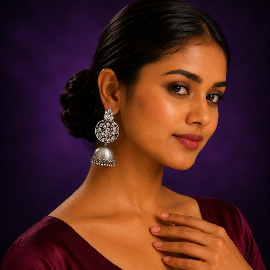 Oxidized Silver Round Jhumka Earrings with White Stone Floral Design