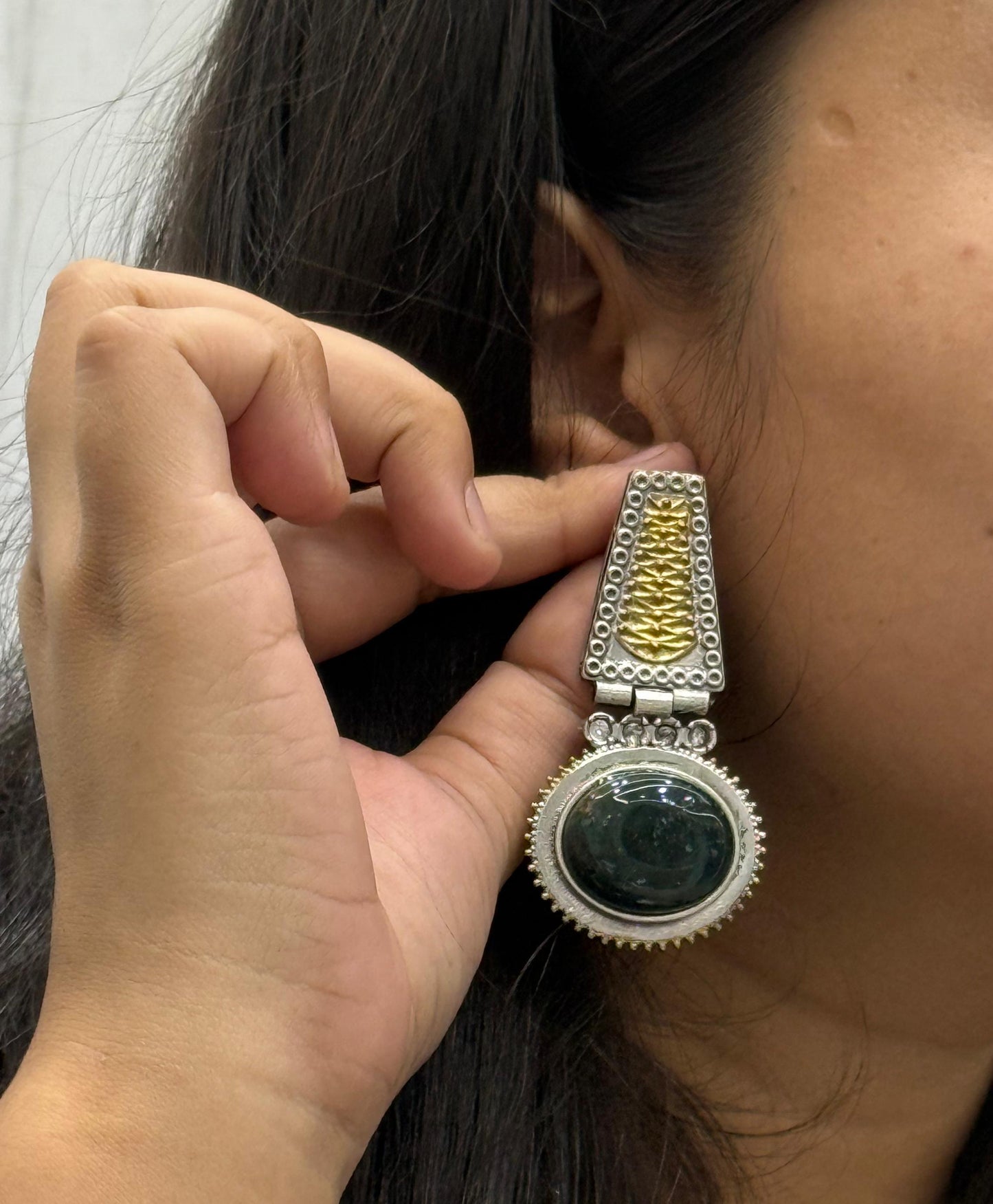Handcrafted Dual-Tone Earrings with Green Stone and Ethnic Design