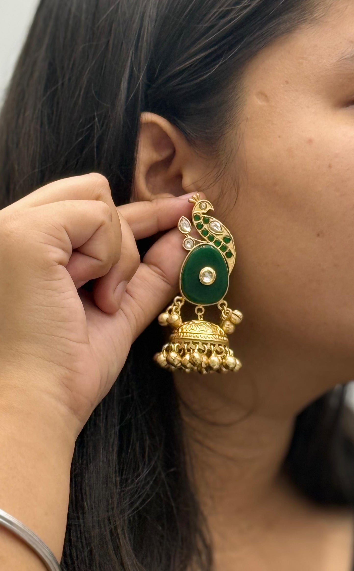 Gold-Plated Peacock Design Jhumka Earrings with Green Stone & Kundan Detailing