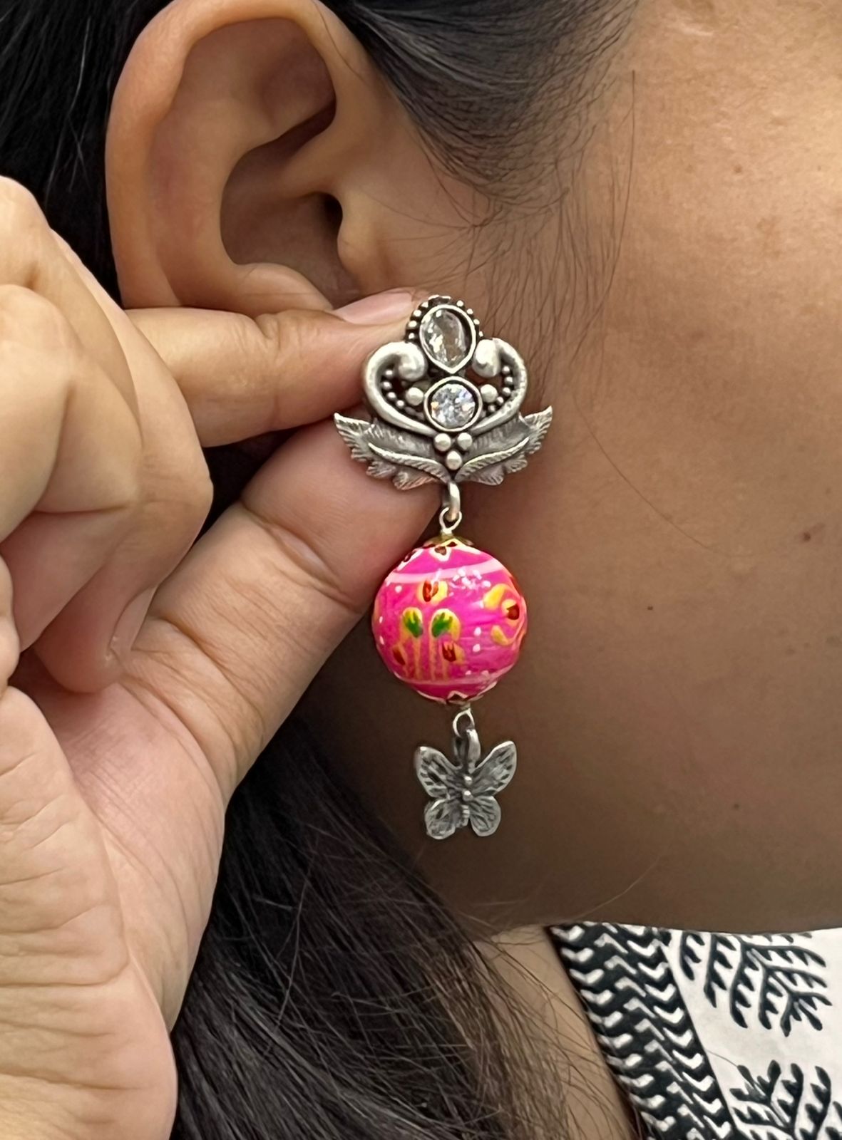 Hand-Painted Pink Bead Drop Earrings with Butterfly Charm & Oxidized Silver Detail
