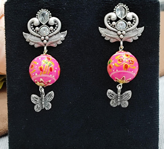 Hand-Painted Pink Bead Drop Earrings with Butterfly Charm & Oxidized Silver Detail