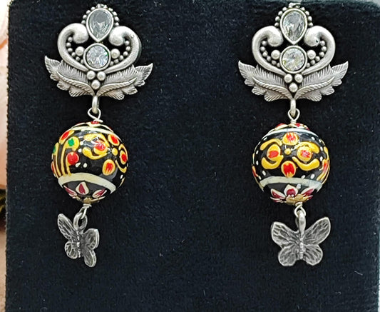 Hand-Painted black Bead Drop Earrings with Butterfly Charm & Oxidized Silver Detail