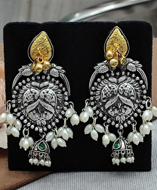 Oxidized Silver Jhumka Earrings with Green Pearl Beads & Antique Gold Detailing