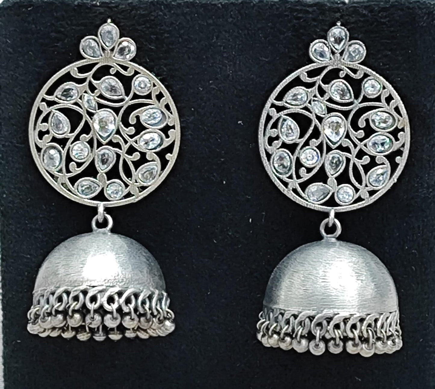 Oxidized Silver Round Jhumka Earrings with White Stone Floral Design