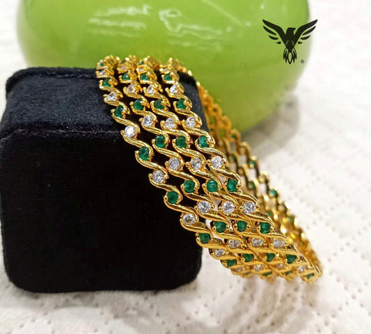 Anshi Stack Of 4 Gold Plated Bangles Emerald Stone