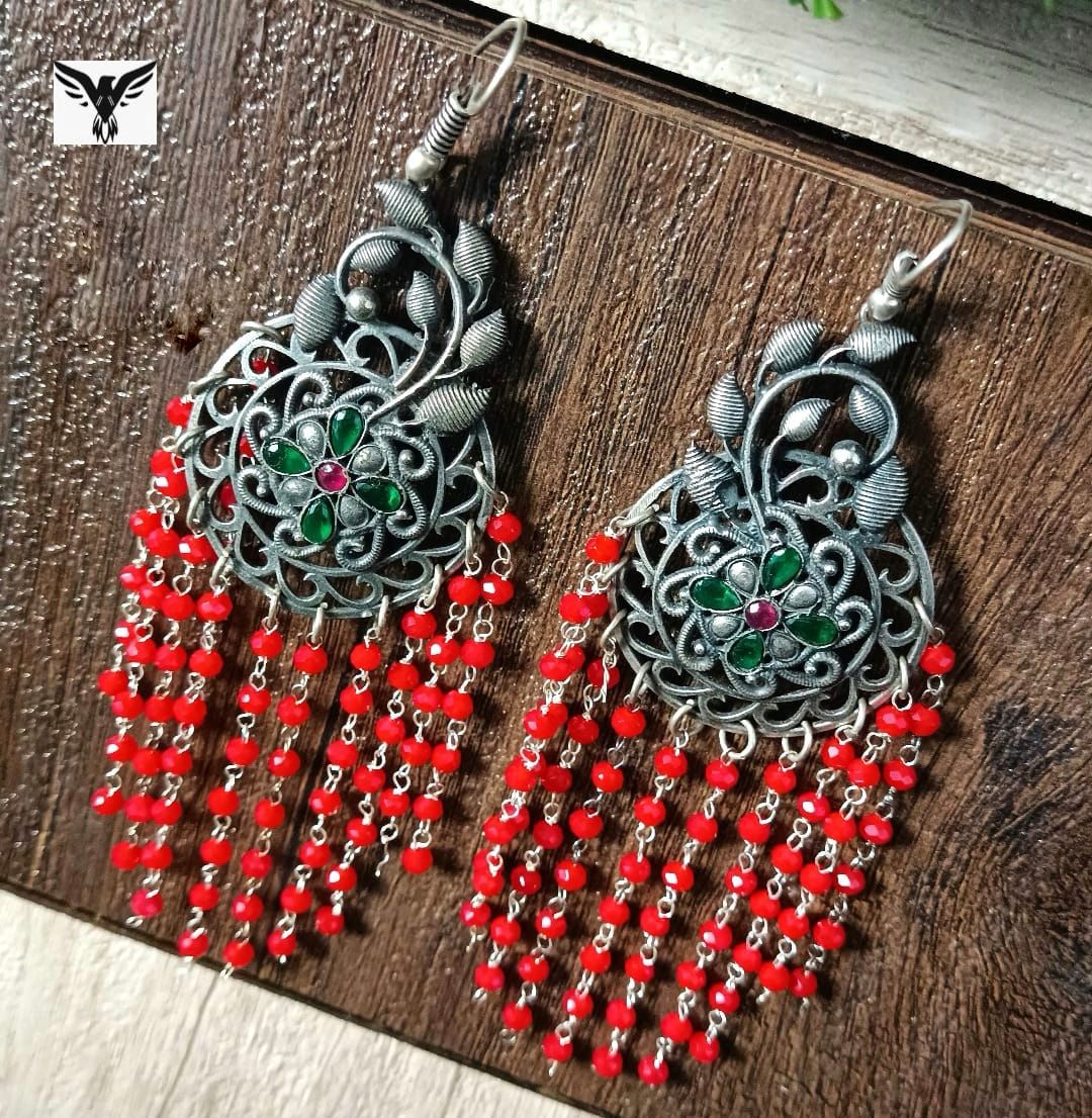 Menika Silver Look Alike Earings In Red For Women