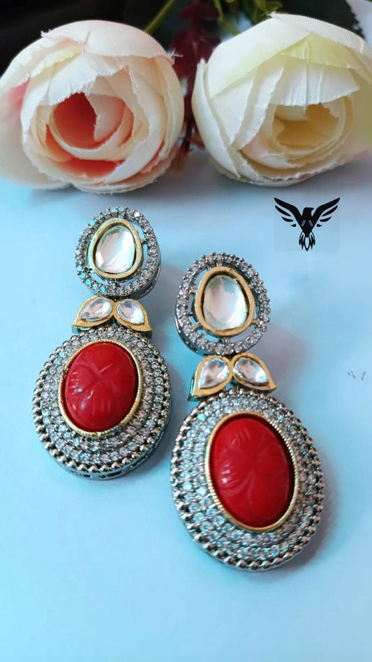 Nandini Kundan Carved Stone Earings In Red For Women