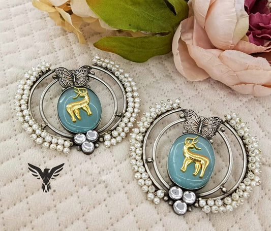 Rashmika Silver Look Alike Butterfly Studs In Turquoise For Women