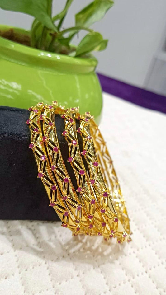 Anvi Stack Of 4 Gold Plated Bangles In Ruby Stone