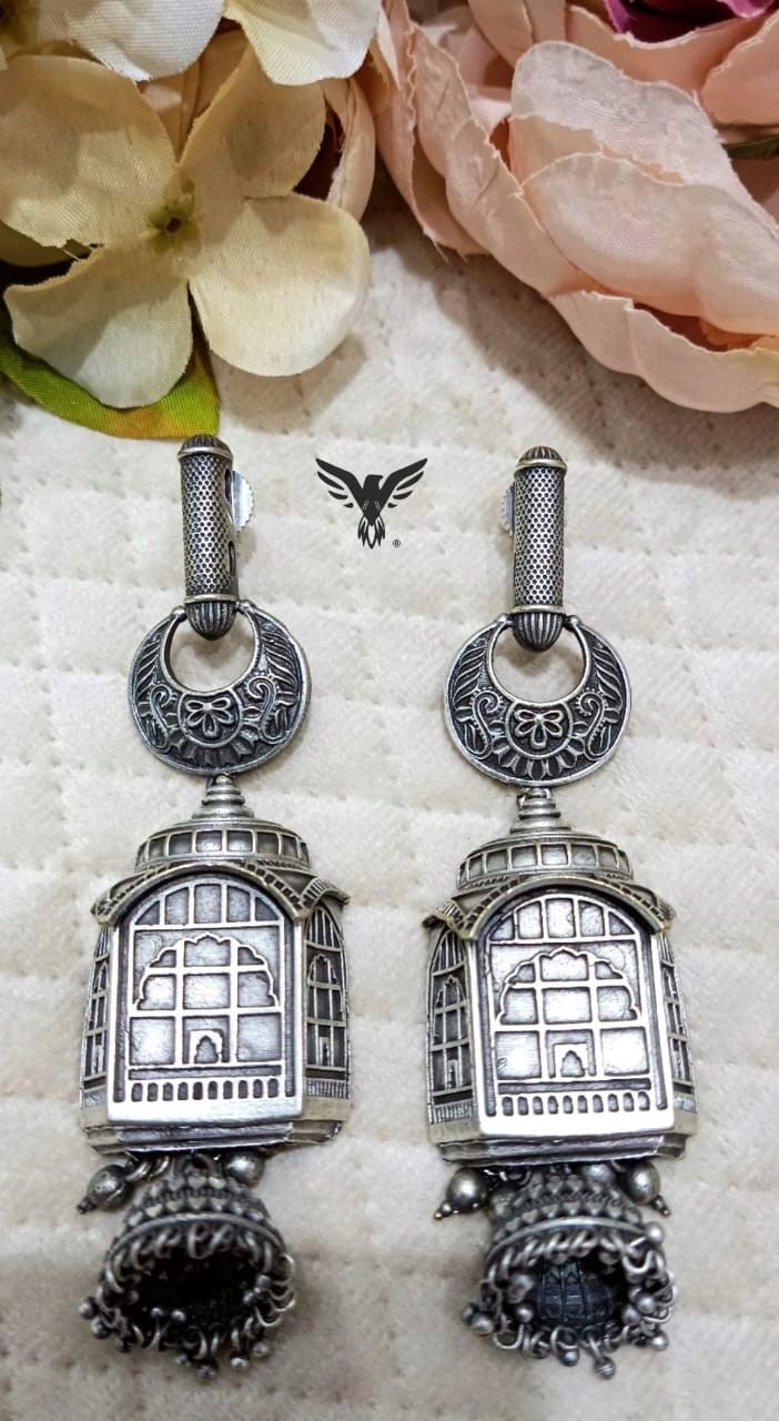 Aashvi long silver look alike earrings