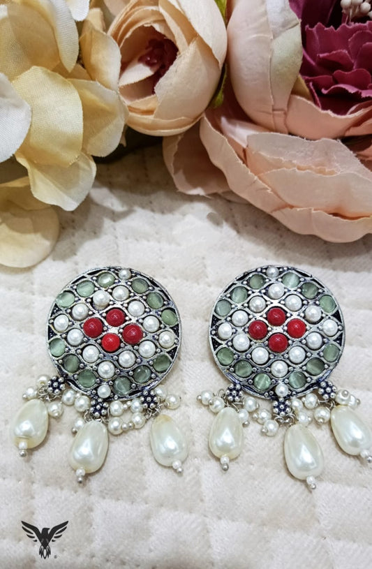 Harini red round silver look alike earrings with hanging pearl drops