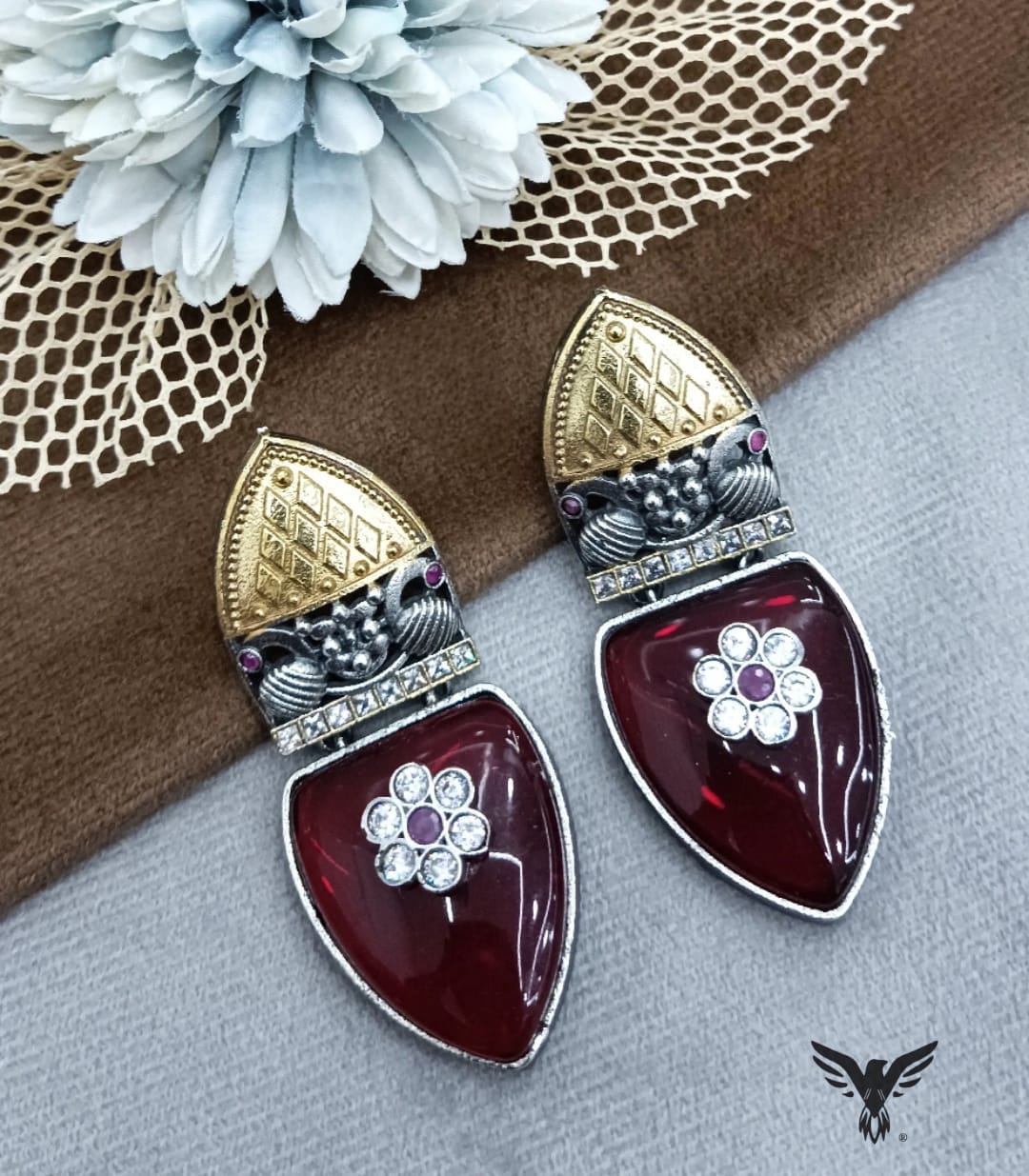 Omya Dual tone Silver look alike earring in Ruby For Women