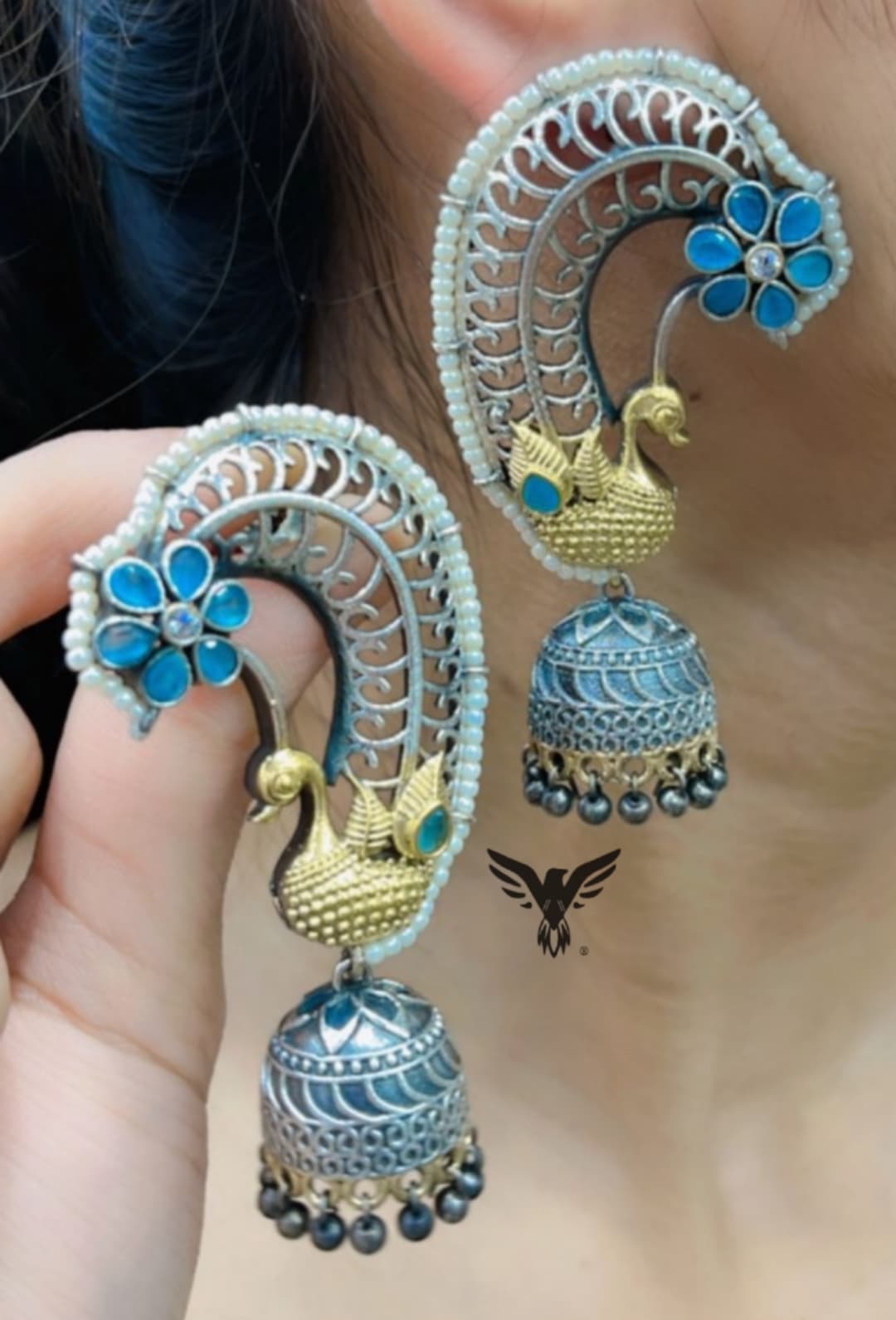 Peacock silver look alike earcuff like  in ocean blue earrings