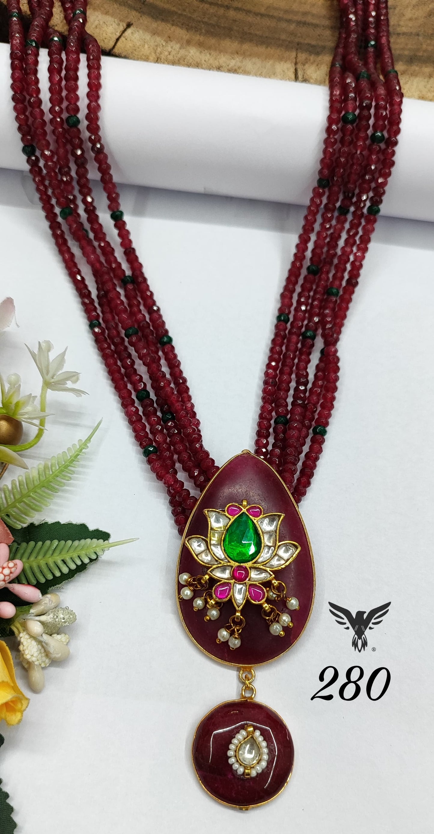 Long beaded mala with broad pendent in ruby with lotus  for women