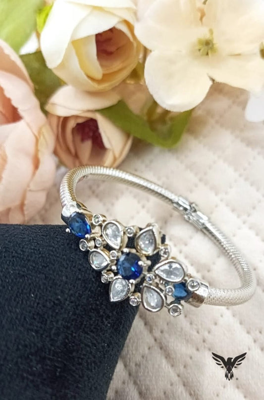 WHITE CZ STONE WITH BLUE AD DIAMOND