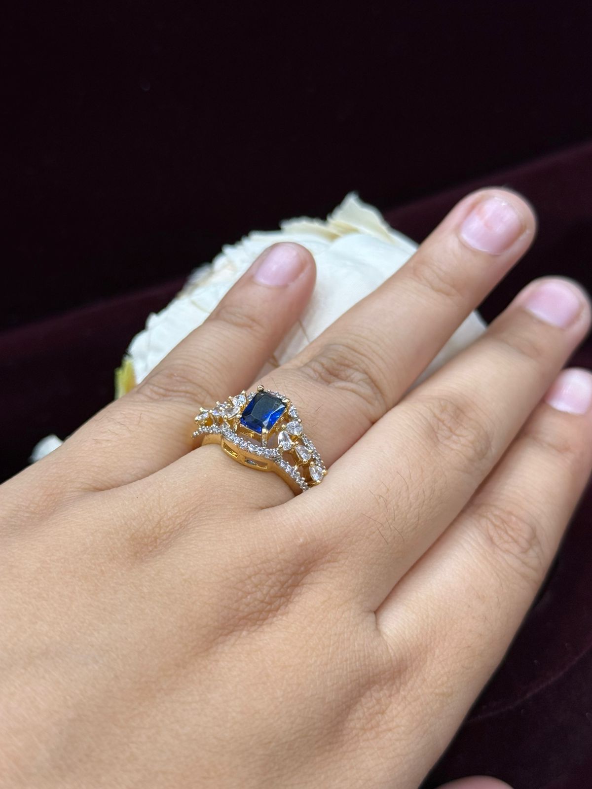 GOLDEN POLISH WITH BLUE STONE WITH CZ RING FOR WOMEN