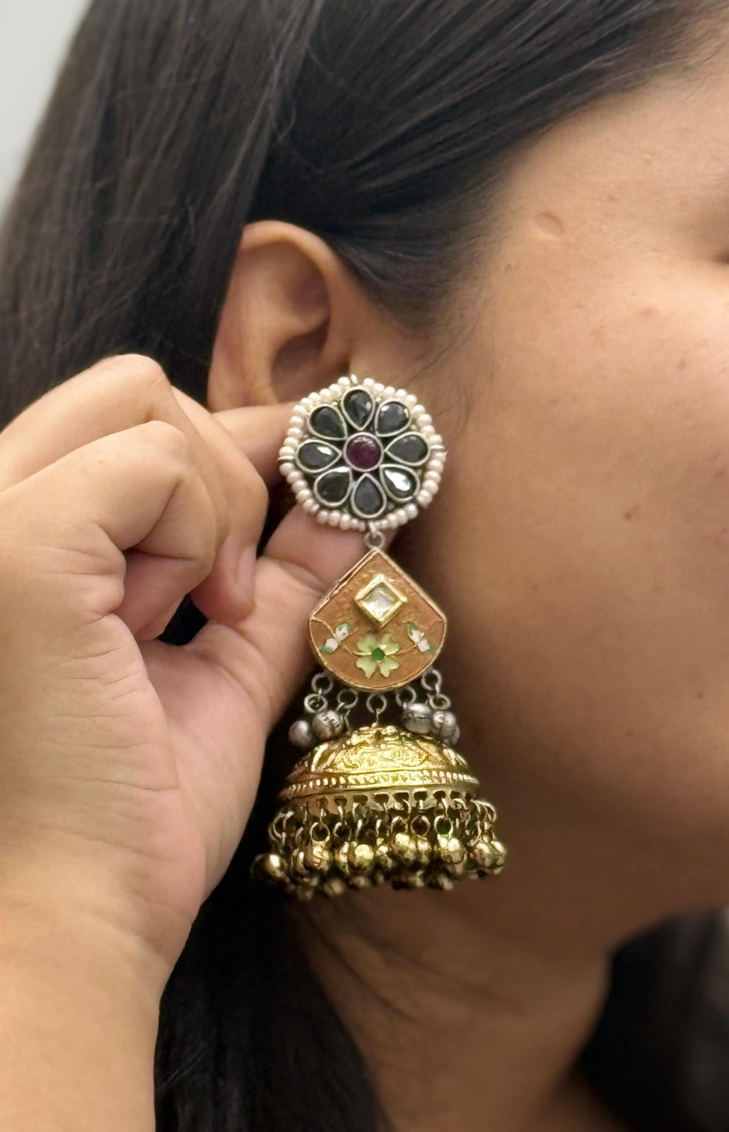 Designer Dual-Tone Jhumka Earrings with Black Stones and Enamel Detailing