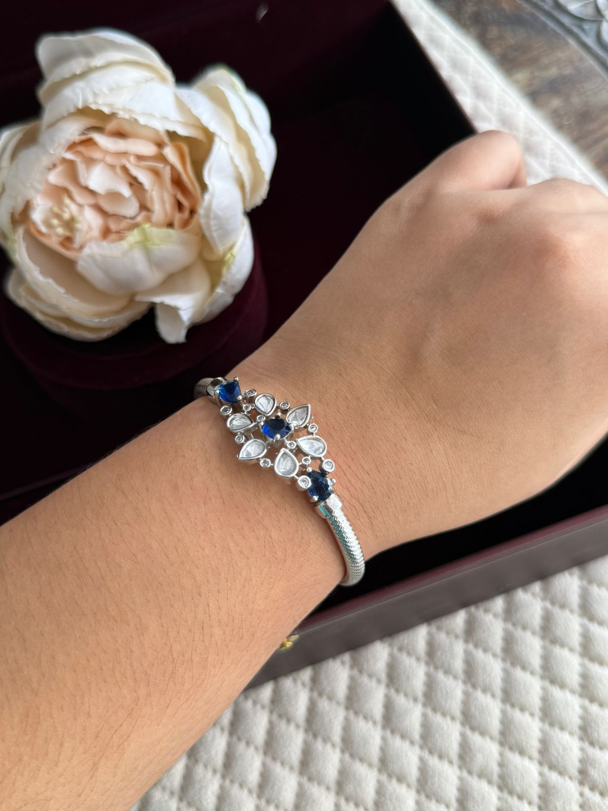 WHITE CZ STONE WITH BLUE AD DIAMOND
