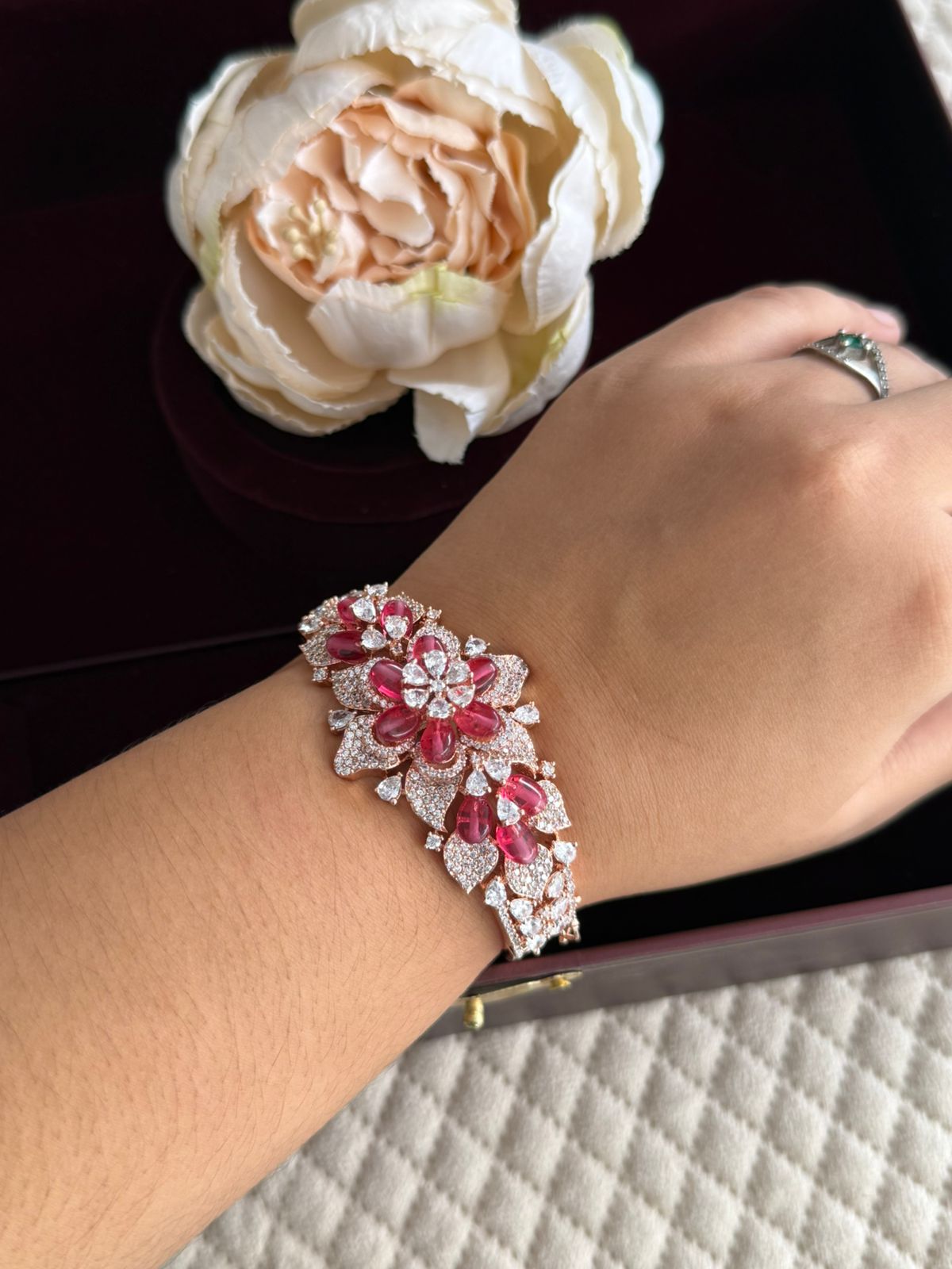 RED COLOUR WITH GOLDEN POLISH  UNIQUE SHAPE AD BRACELET