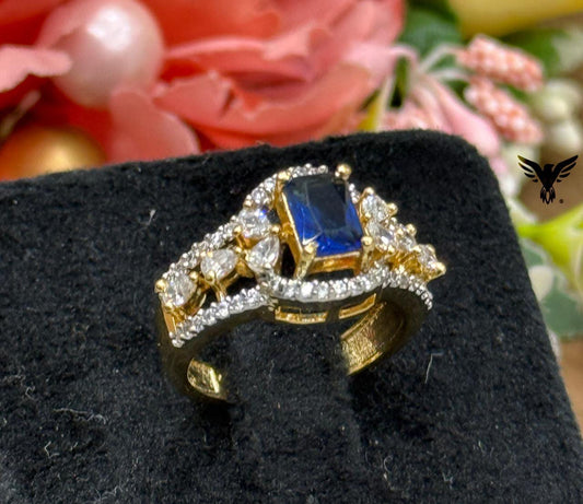 GOLDEN POLISH WITH BLUE STONE WITH CZ RING FOR WOMEN