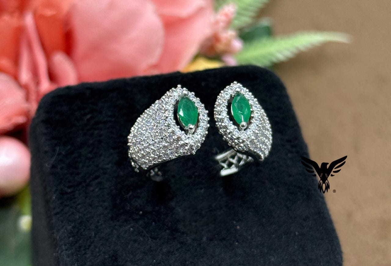 UNIQUE SHAPE WITH SILVER POLISH GREEN STONE RING